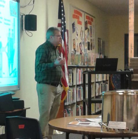 Tom Miles giving examples of biochar production at various scales
